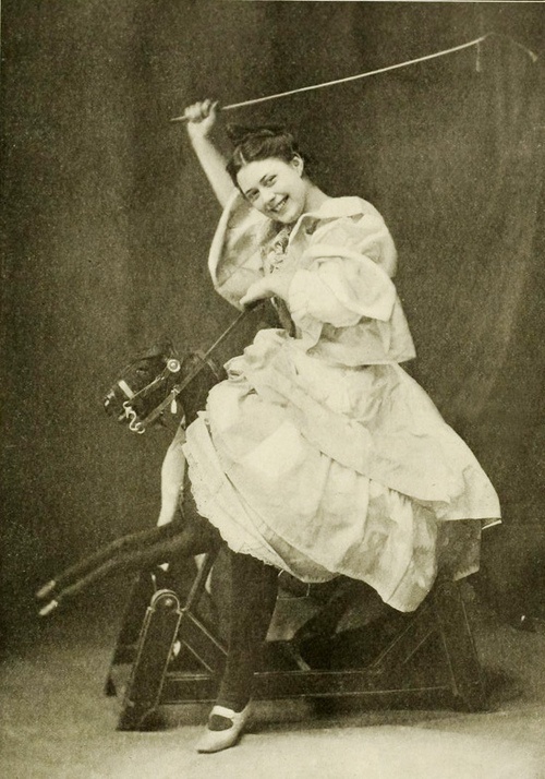 Holiday Spirit, 1904. Edwardian girl on rocking horse.