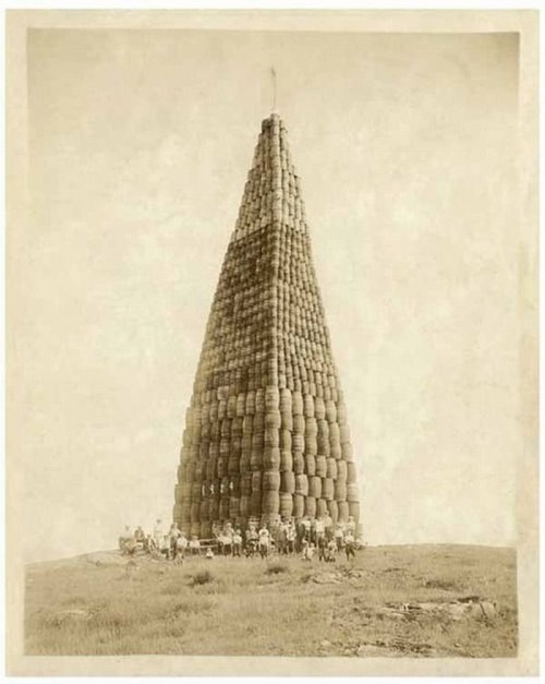Tower of alcohol barrels to be burned during the Prohibition, 1924