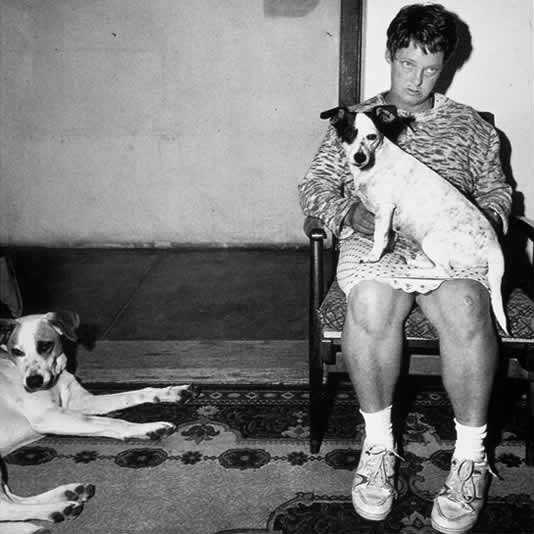 Roger Ballen Woman-and-dogs-Orange-Free-State-1994