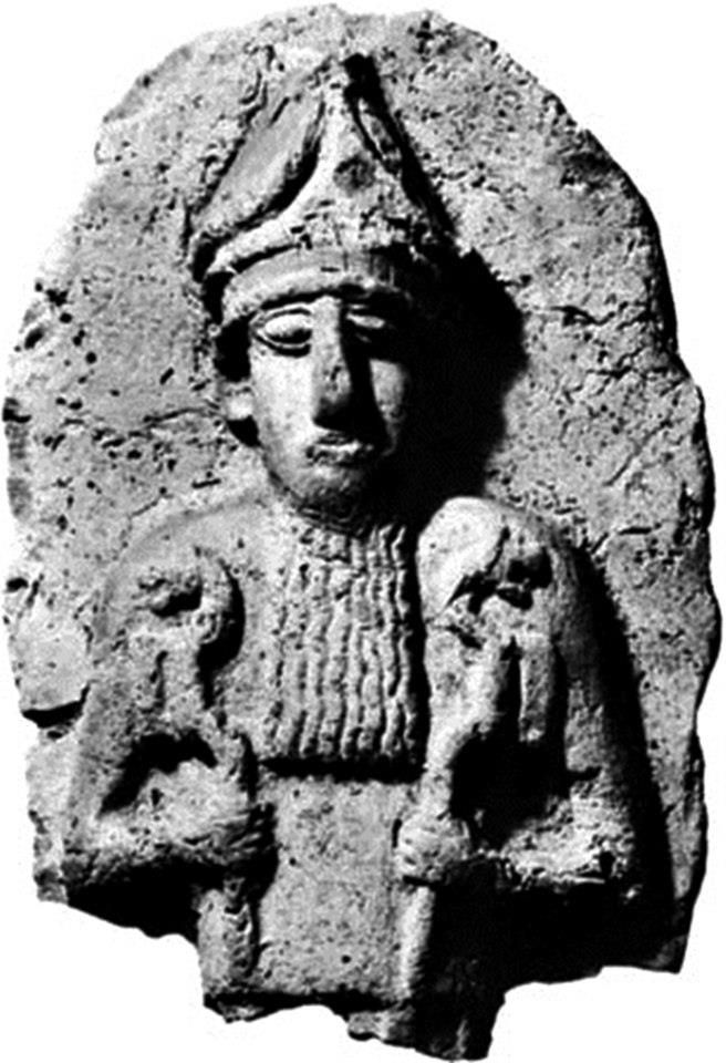 Nergal - Mesopotamian god of the underworld - holding his lion headed staffs - Terra-cotta relief found Kish, c. 2.100-1.800 BCE